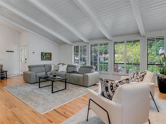 Lots of natural light throughout the living room.