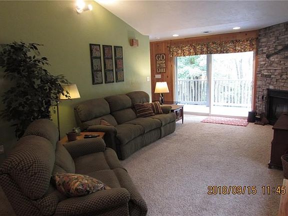 Plenty of room for entertaining or just relaxing with views of the woods.