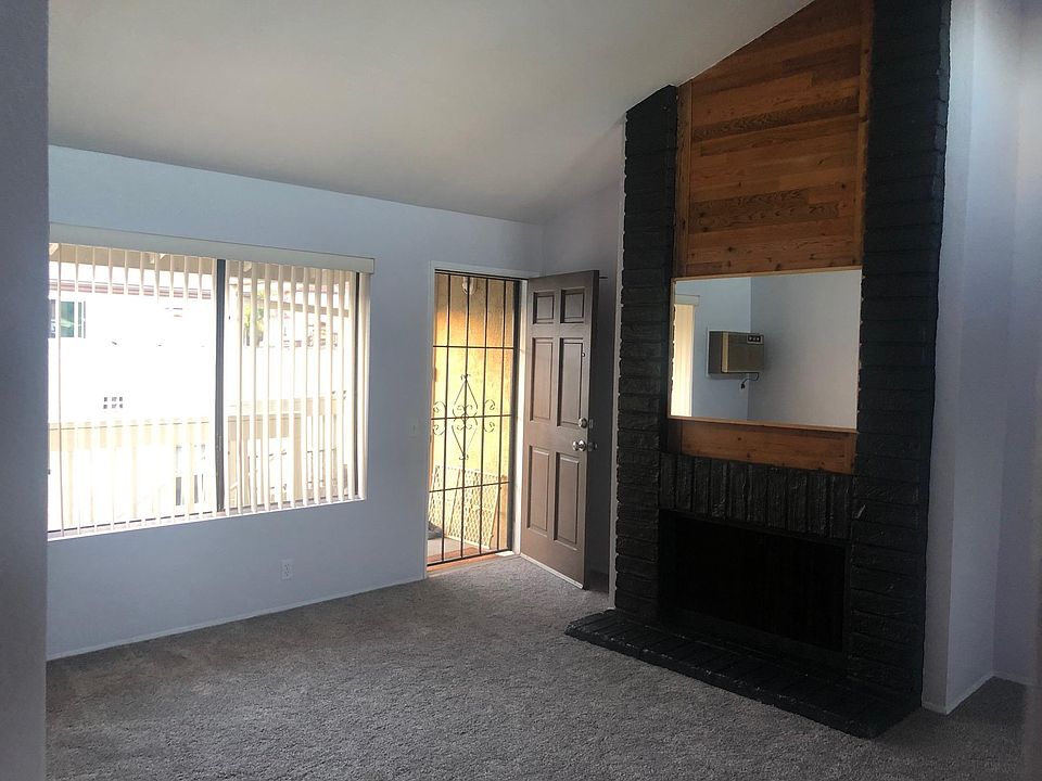 Living room with vaulted ceiling