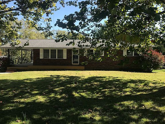 Mature trees in front yard.