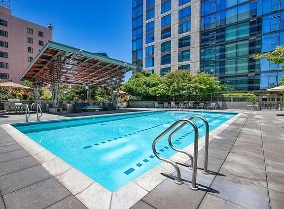 Pool area with 2 hot tubs
