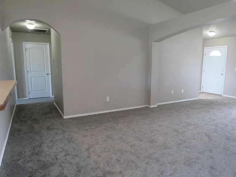 Living room view of Hallway and linen closet