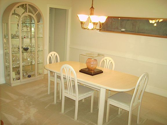 Formal dining room connected to kitchen