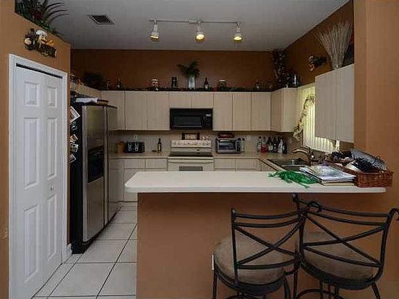 5th image of 14116 S Cypress Cove Cir