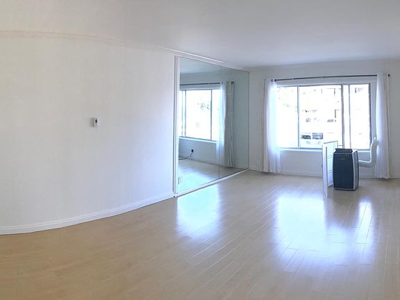 Bright and clean southern exposure with wood floors, built-i
