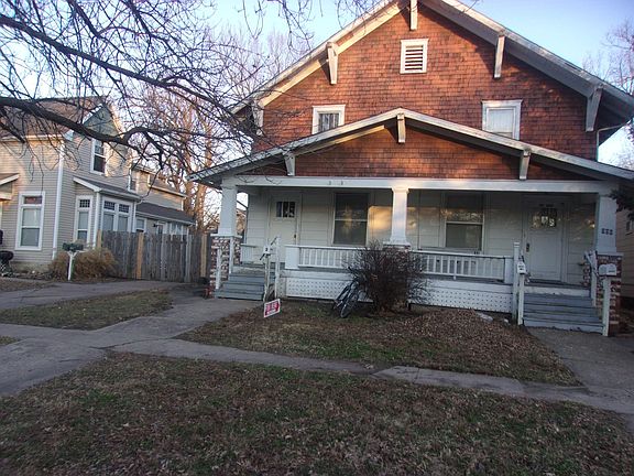Street view North door is available unit. Property faces west. Note usable front porch area.