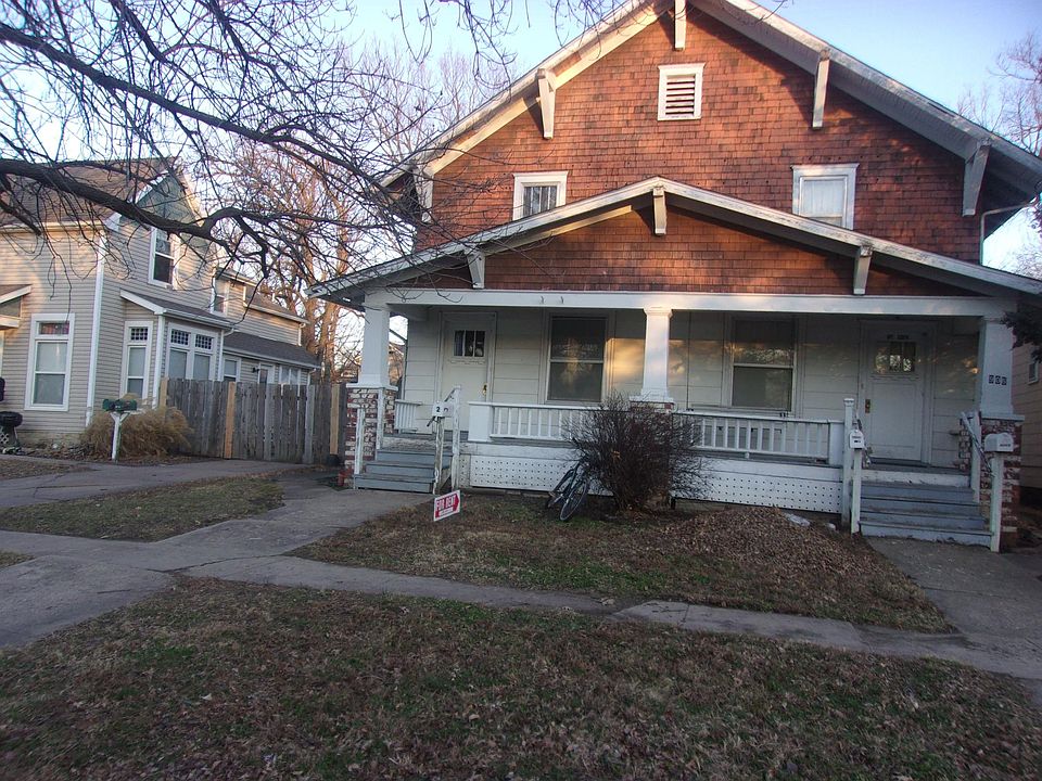 Street view North door is available unit. Property faces west. Note usable front porch area.