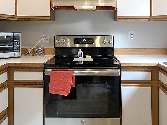 Kitchen (center) - New glass-top range and stainless fan hood summer 2018