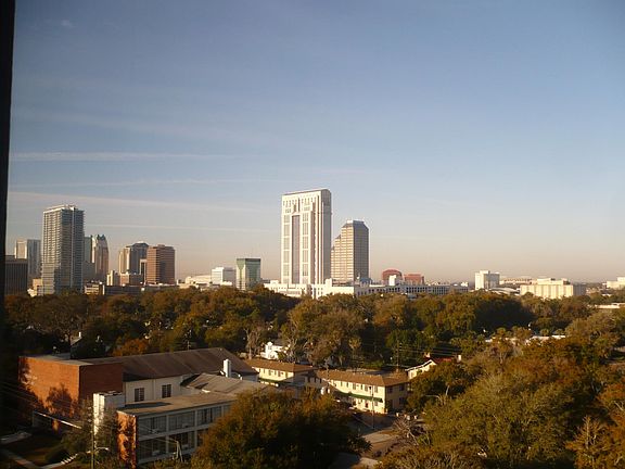 DOWNTOWN VIEW FROM WRAPAROUND BALCONY