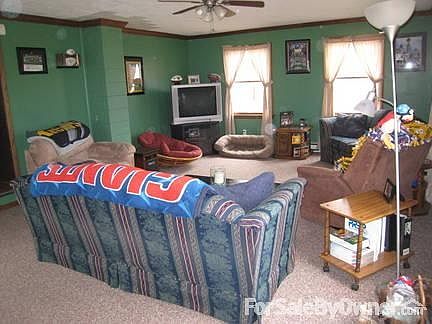 Family Room
						:
						Large family room with 5 windows and door to other deck and yard