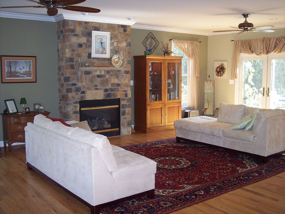 Living Room with Stacked Stone FP