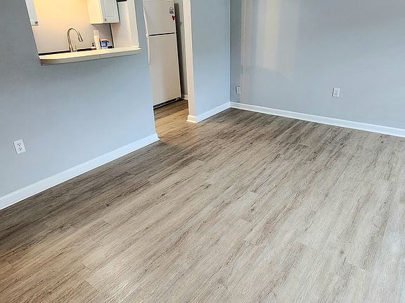 Living room looking into kitchen
