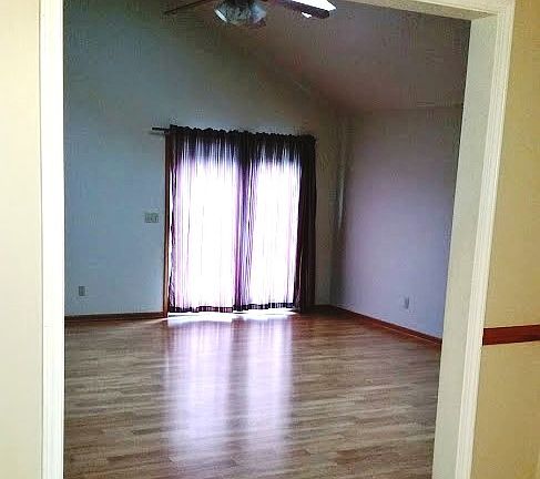 Family Room (Vaulted Ceiling with Fireplace and Skylights)