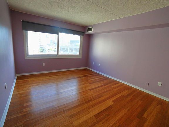 Bedroom easily fits king size bed + furniture