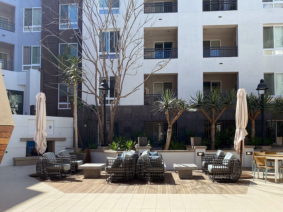 Pool Deck and Fireplace | Elan Huntington Beach | Apartments in Huntington Beach, CA
