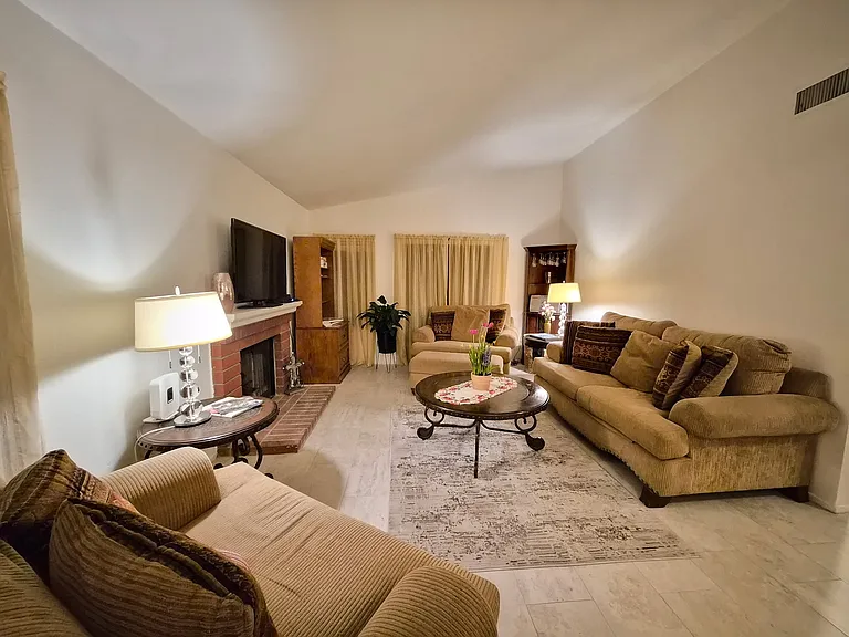 Living room with sofa bed (full size) couch