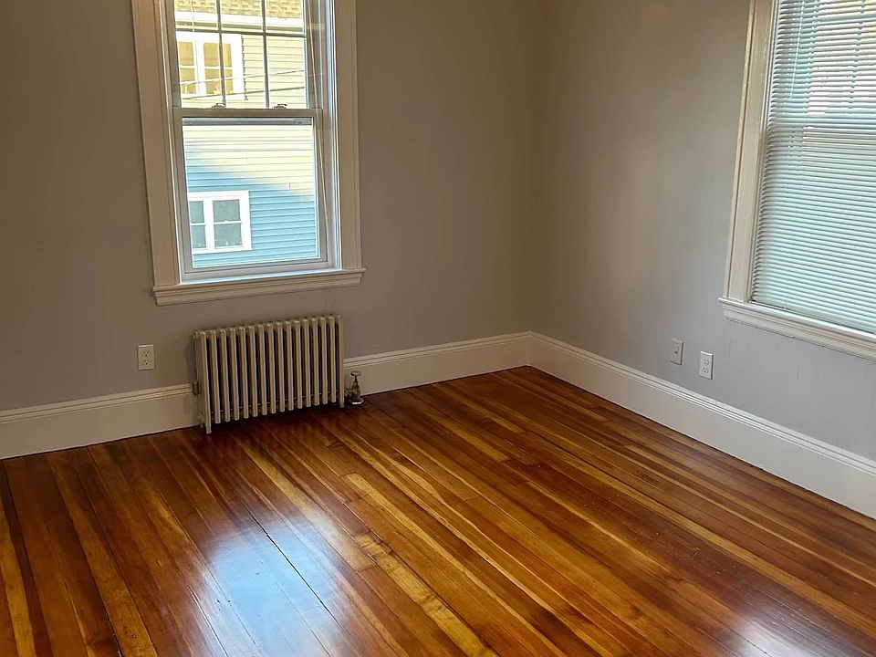 Bedroom 1 on main floor with the kitchen