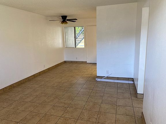Dining and living room with new fan
