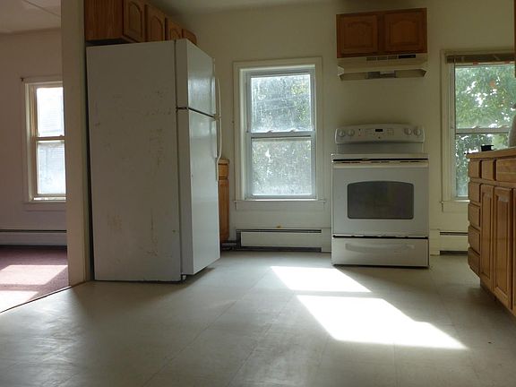 Old photo. New appliances, floor, and paint.
