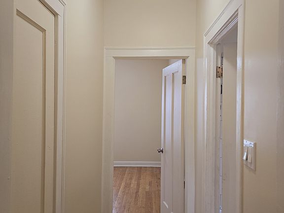 Hallway to bedroom and bathroom