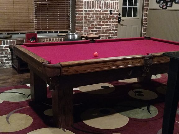 Pool table room in basement