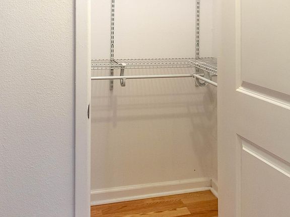 View of walk in closet with Rubbermaid additions