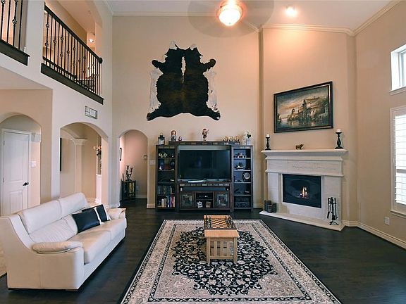 Spacious open floor plan with views of the pool and lake up and down stairs!