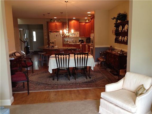 Living Room looking into dining room and kitchen