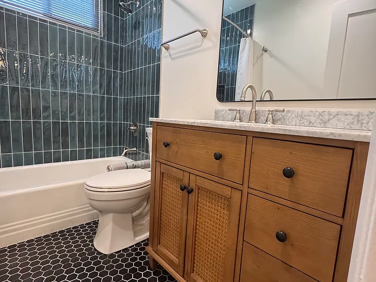 Beautiful cane vanity with quartz countertop