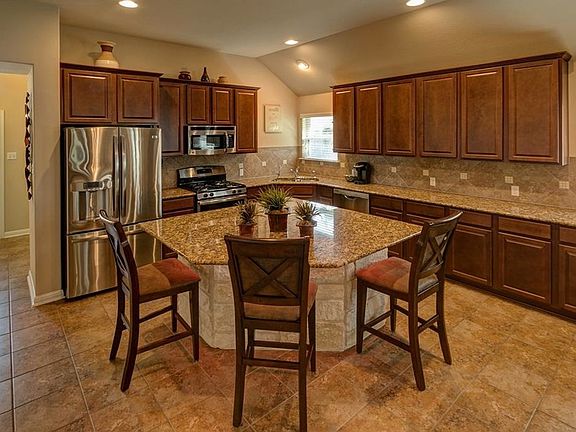 Big kitchen where you can entertain quite a few guests