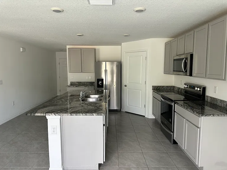 7715 Rosewood Garden Loop — Photo 5