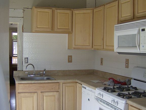 New kitchen w/ cathedral ceiling
