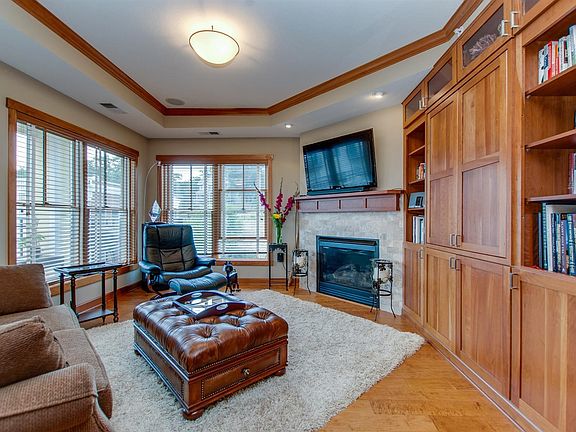 Comfortable Living room area brightened by corner windows!