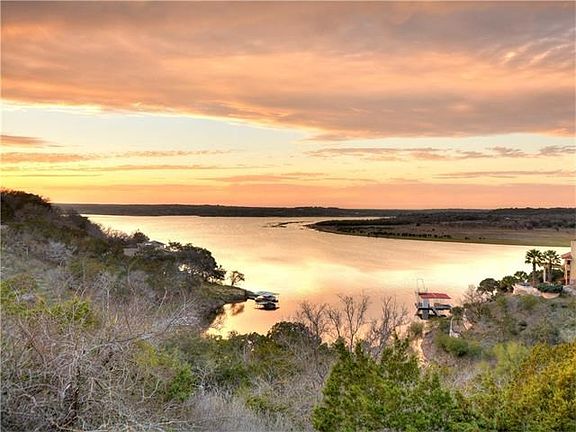 Nestled on a quiet cul-de-sac in a sought-after gated neighborhood boasting breathtaking views of th