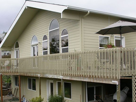 Large Deck with Seating Areas off Master Bedroom and Livingroom