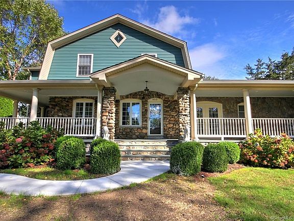 Newly designed walk-way leads you to the gorgeous cover porch!