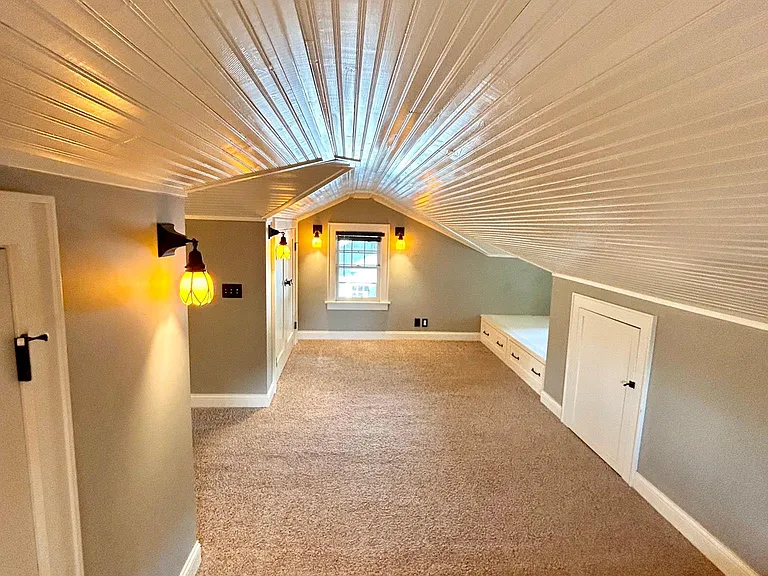 The upstairs loft area has three large closets with hidden storage. This is a wonderful space!