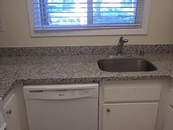Kitchen with granite dishwasher