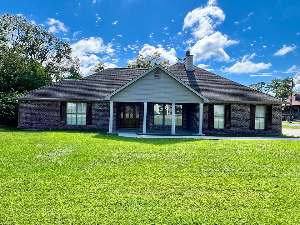 Front of house, on a corner lot.