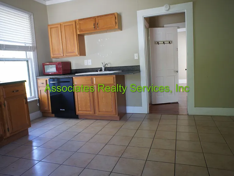 115 NE 9th St — Photo 6