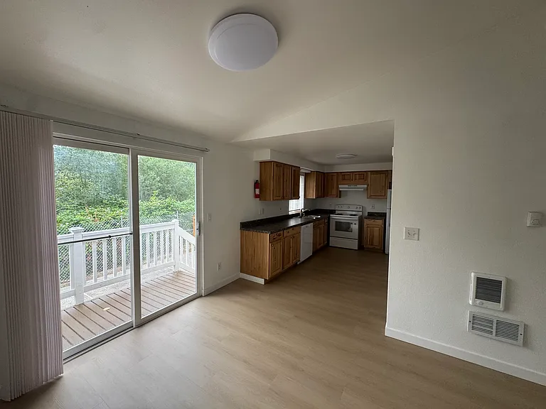 Enjoy a fully fenced backyard with Jennings Park right behind the property - perfect for relaxing, outdoor activities, and enjoying nature.
