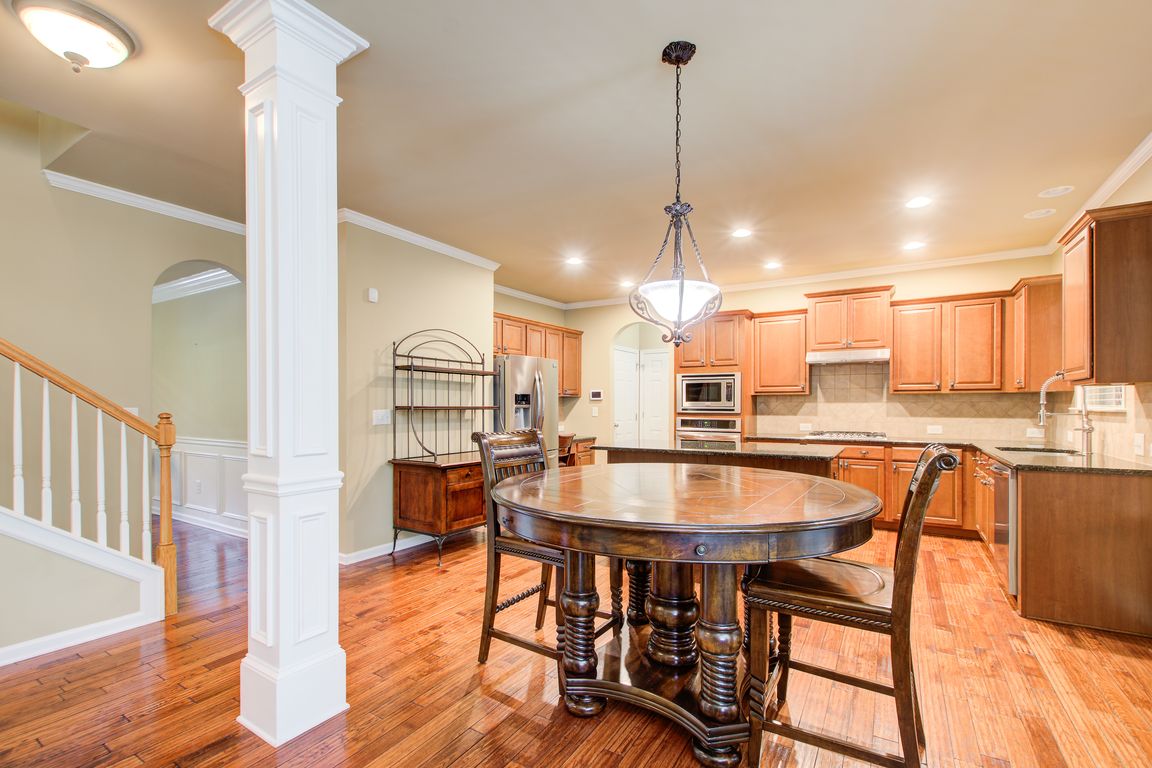 16 Breakfast Area w Dining + Kitchen