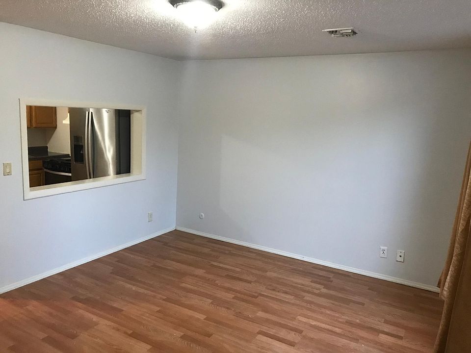 Spacious Living Room with kitchen outlet
