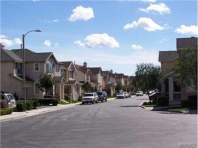 View of the street. A one cul de sac tract up on a hill with co