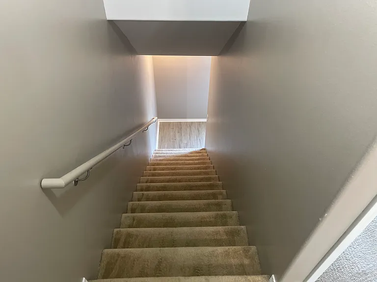 Second staircase from living area to bedrooms