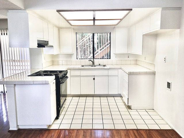 Kitchen, actual unit has a brand new fully updated kitchen.
