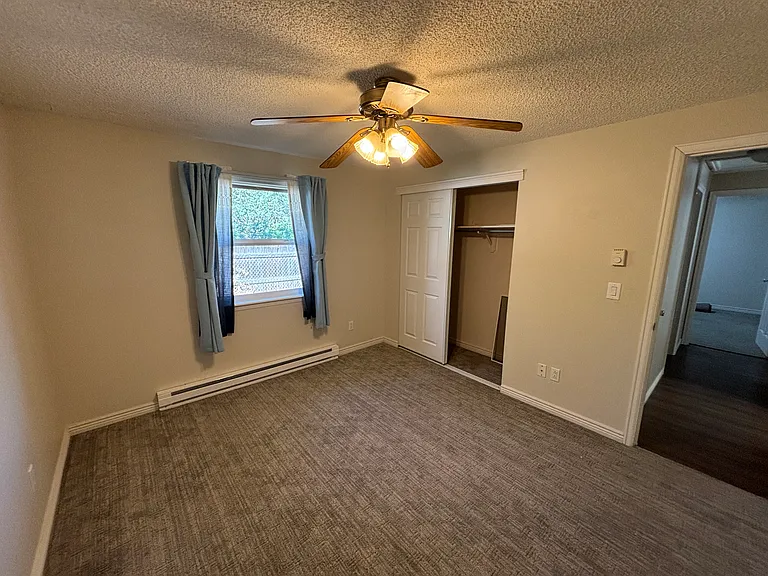 Large bedroom with spacious closet.
