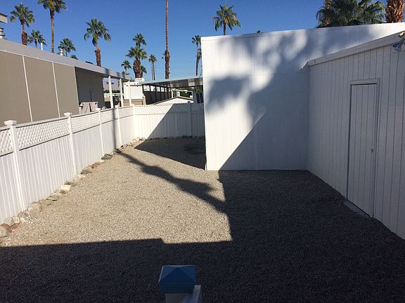 Left Yard Behind Front Patio