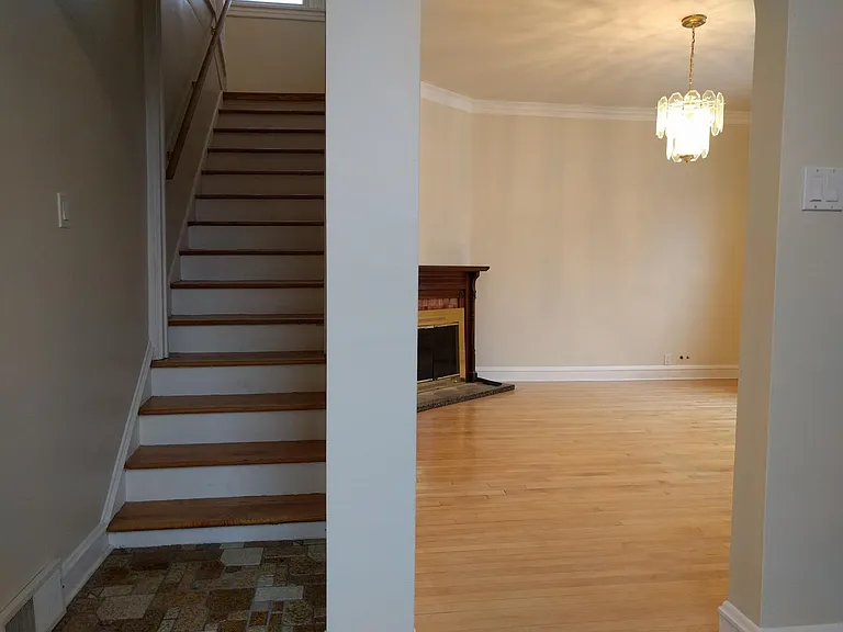 Stairs up and living room