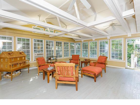 Beautiful Four Seasons Room with Dual Pane Tilt In Windows